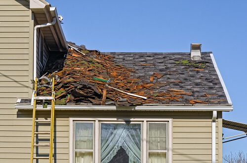 Roof with debris from a storm